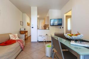 Μια τηλεόραση ή/και κέντρο ψυχαγωγίας στο Appartamento Verdemare