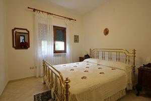 Кровать или кровати в номере Casa Di Michele e Chiara