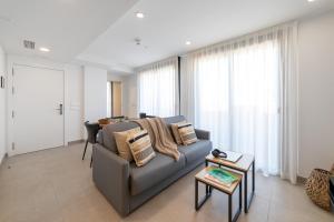Alidreams Lola Center Apartamentos的休息区