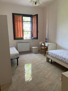 Posteľ alebo postele v izbe v ubytovaní Villa singola a 1300 mt dal mare