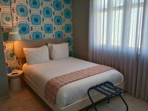 Postel nebo postele na pokoji v ubytování Trópica Beach Hotel