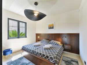 Postel nebo postele na pokoji v ubytování Beachfront Villa Mediterranea