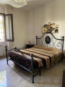 Posteľ alebo postele v izbe v ubytovaní Villa singola a 1300 mt dal mare