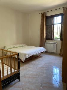 Posteľ alebo postele v izbe v ubytovaní Villa singola a 1300 mt dal mare