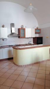 a kitchen with a sink and a counter top at A casa di nonna Elvira in Vietri sul Mare +16 photos