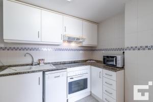 Kuchyňa alebo kuchynka v ubytovaní Apartamento Apolo XVI 1 17 - Grupo Turis