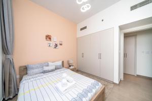 Postel nebo postele na pokoji v ubytování ALH Vacay - 1 Bedroom in Dubai Hills Park Heights