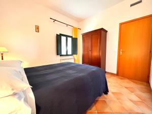 Posteľ alebo postele v izbe v ubytovaní I Girasoli di Lari - Appartamento Indipendente 2 camere da letto