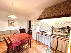 Kuchyňa alebo kuchynka v ubytovaní I Girasoli di Lari - Appartamento Indipendente 2 camere da letto