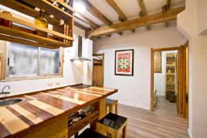 a kitchen with a sink and a counter top at Beach House San Sebastian in San Sebastián