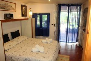 Ένα ή περισσότερα κρεβάτια σε δωμάτιο στο Casa vacanze Villa Nicò Gaeta