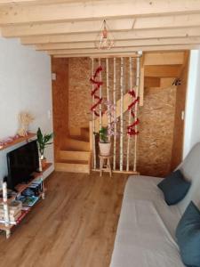 Televízia a/alebo spoločenská miestnosť v ubytovaní Maison de ville 4pers