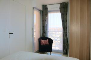 Posteľ alebo postele v izbe v ubytovaní Port-Fréjus, LE CONSUL, appartement 2 pièces climatisé, terrasse & parking