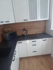 Kuchyňa alebo kuchynka v ubytovaní Apartament u Kasi z widokiem na Zamek Malborski