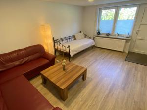 Postel nebo postele na pokoji v ubytování Schöne Wohnung mit Garten beim Outletcenter 5 km