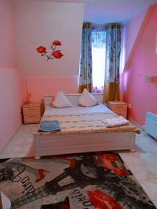 Posteľ alebo postele v izbe v ubytovaní Valloris Apartments