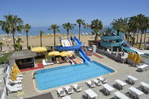 a water slide at a resort with a swimming pool at Admiral Hotel in Kizkalesi