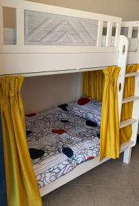 a bunk bed in a room with a bunk bed at The Mood House I Dubai Marina in Dubai