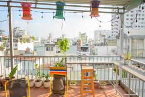 a balcony with a view of a city at Jasmine Hotel in Ho Chi Minh City