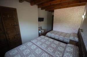Posteľ alebo postele v izbe v ubytovaní Posada Casa de Julia