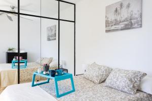 Ένα ή περισσότερα κρεβάτια σε δωμάτιο στο Home2Book Casa Malena Tabaiba Seaview +31 φωτογραφίες