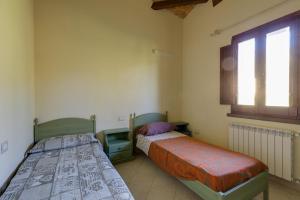 A bed or beds in a room at Vivi Natura Még 32 kép