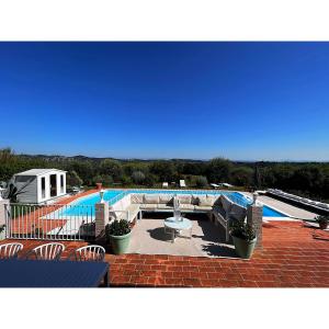 Bazén v ubytovaní Villa Casa Collina Castelfalfi with amazing salt waterpool & AIRCO & VIP service alebo v jeho blízkosti