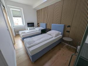Postel nebo postele na pokoji v ubytování Hotel Tempelhof - City-Messe-Arena