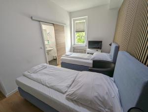 Postel nebo postele na pokoji v ubytování Hotel Tempelhof - City-Messe-Arena