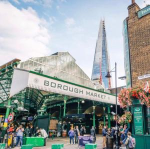 a view of borough market with the shard in the background at Morden 2 bedroom Apartment tower bridge in London