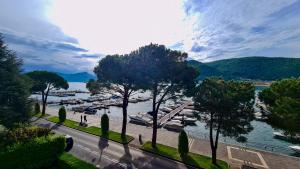 a view of a marina with boats in the water at VistaLago Loft in Sarnico
