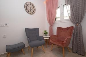 Posezení v ubytování Anthi Beach Suite by "elite"