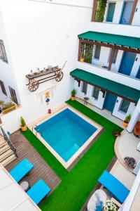 an aerial view of a villa with a swimming pool at 7 Art Feslegen Hotel By Egeos in Bodrum City