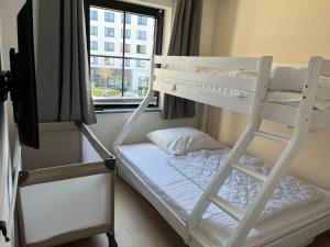Postel nebo postele na pokoji v ubytování Haus Titania Wohnung Meerblick