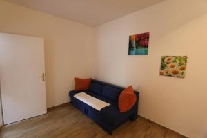 Ein Sitzbereich in der Unterkunft Apartment Zinka