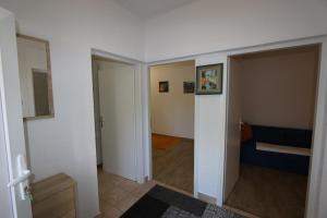 Ein Bett oder Betten in einem Zimmer der Unterkunft Apartment Zinka