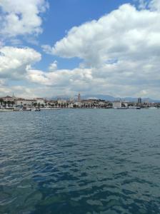 a large body of water with a city in the background at Apartment Bella in Split