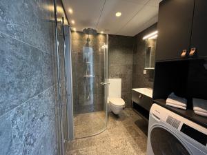 Koupelna v ubytování ÅhusBrygga Apartment Hotel