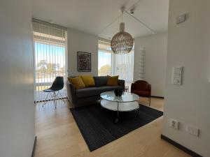 Posezení v ubytování ÅhusBrygga Apartment Hotel