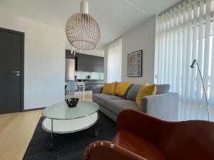 Posezení v ubytování ÅhusBrygga Apartment Hotel