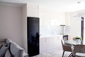 A kitchen or kitchenette at Εrmis Mini Suite #2