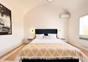 Postel nebo postele na pokoji v ubytování Villa a la montagne Hammamet + 37 fotografií