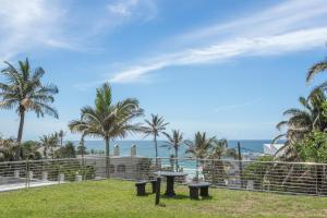 a view of the ocean from the balcony of a house at Chaka's Cove 66 in Ballito
