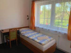 Rúm í herbergi á Hotel Rabbit