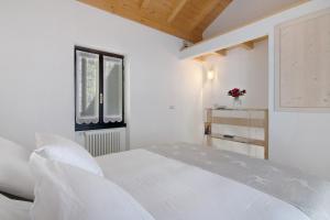 Ένα ή περισσότερα κρεβάτια σε δωμάτιο στο Borgo Vico