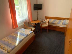 Rúm í herbergi á Hotel Rabbit