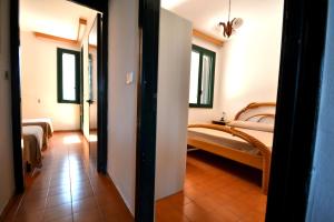 Voodi või voodid majutusasutuse Comfortable three-room villa located in Torre dellOrso on the ground floor toas