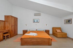 Ein Bett oder Betten in einem Zimmer der Unterkunft Villa Juric
