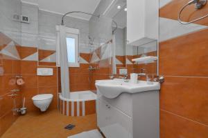 Ein Badezimmer in der Unterkunft Villa Juric