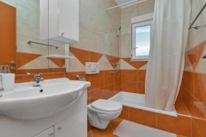 Ein Badezimmer in der Unterkunft Villa Juric